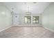 Comfortable living room featuring tile flooring and a light-filled space at 517 Seville Ave, Altamonte Springs, FL 32714