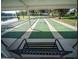 Enjoy a game of shuffleboard near the lake with a covered area to keep you out of the sun at 59 Aberdeen Cir, Leesburg, FL 34788