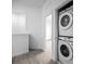 Convenient in-unit stacked washer and dryer located in the laundry area for easy access at 625 Trikomo Dr, Davenport, FL 33896