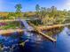 Scenic community dock on the water, ideal for fishing and enjoying waterfront views at 7515 John Hancock Dr, Winter Garden, FL 34787