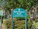 Interlaken Park sign indicating the park's name, address, and management by Orange County Parks & Recreation at 85 Interlaken Rd, Orlando, FL 32804