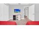 ' themed bedroom with playful decor, storage, and adjacent room access at 9017 Dogleg Dr, Davenport, FL 33896