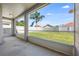 Screened patio overlooking a spacious backyard, perfect for outdoor relaxation at 944 Glen Abbey Cir, Winter Springs, FL 32708