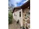 Exterior view of the house, featuring stone accents and a well-maintained siding at 1029 Michelle Ct, Tavares, FL 32778