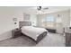 Bright bedroom with a ceiling fan, plenty of natural light, and a king size bed at 1100 Downswing Pl, Davenport, FL 33896