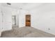 Spacious bedroom featuring neutral carpet and natural light at 1443 Lassen St, Haines City, FL 33844
