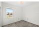 Cozy bedroom with carpet flooring, ceiling light, and window at 1443 Lassen St, Haines City, FL 33844