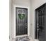 Close-up of front door with wreath, set in a modern home exterior at 1443 Lassen St, Haines City, FL 33844