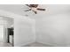 Cozy kitchenette featuring sleek appliances, tiled floors, and white cabinetry at 1443 Lassen St, Haines City, FL 33844