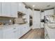 Well-equipped kitchen with modern appliances, stylish backsplash, ample cabinetry, and functional design elements at 211 Venetian Palms Blvd, New Smyrna Beach, FL 32168