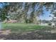 Spacious backyard with white picket fence and lake view at 2743 Grandola Dr, Orlando, FL 32811