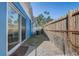 Small backyard space enclosed with a fence at 2743 Grandola Dr, Orlando, FL 32811