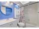 Bathroom featuring a vanity sink, bathtub, shower and stylish decor at 2743 Grandola Dr, Orlando, FL 32811