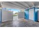 Covered carport with open gate and exterior storage closet at 2743 Grandola Dr, Orlando, FL 32811