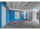 Cozy patio area featuring a white door and fence providing privacy at 2743 Grandola Dr, Orlando, FL 32811