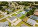 An aerial view of a home that includes a large front and back yard and well maintained surrounding homes at 3324 Sw 137Th Loop, Ocala, FL 34473