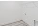 A walk in closet with gray, wood-look floors and wire shelving at 3324 Sw 137Th Loop, Ocala, FL 34473