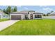 Beautiful, modern single Gathering home with well-maintained lawn and a two-car garage at 3324 Sw 137Th Loop, Ocala, FL 34473