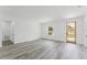 Bright and spacious living room with gray flooring, and an abundance of natural light at 3324 Sw 137Th Loop, Ocala, FL 34473