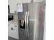 New stainless steel refrigerator featuring a water dispenser, ice maker, and modern design enhances the kitchen at 3324 Sw 137Th Loop, Ocala, FL 34473