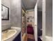 This bathroom offers a sink, toilet, and a textured wall and is connected to a bedroom at 3471 Whitner Way, Sanford, FL 32773