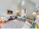 Bright bedroom with high ceilings, natural light, and classic decor, offering a comfortable and inviting space at 3471 Whitner Way, Sanford, FL 32773