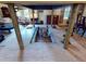 Close-up view of an in-floor fireplace with stone surround and firewood, adding warmth and character at 3471 Whitner Way, Sanford, FL 32773