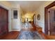 Spacious hallway with detailed trim, natural lighting, and seamless transition between rooms at 3471 Whitner Way, Sanford, FL 32773