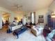 Comfortable living room with a ceiling fan, lots of natural light, and classic furnishings at 3471 Whitner Way, Sanford, FL 32773