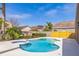 Backyard view of a sparkling pool with a spa and well-maintained landscaping on a sunny day at 3814 Aiden Pl, Apopka, FL 32703