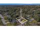 Aerial view of the home showcasing location among mature trees with a boundary line superimposed over the image at 442 Tanglewilde St, Apopka, FL 32712