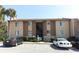 A charming, multi-story condo building with designated parking and lush landscaping at 626 Orange Dr # 242, Altamonte Springs, FL 32701