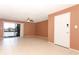 Living room with a ceiling fan, sliding glass doors to a balcony, and ceramic tile flooring at 626 Orange Dr # 242, Altamonte Springs, FL 32701