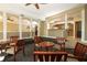 Inviting resident lounge featuring cozy seating areas and convenient bar access for relaxed social gatherings at 626 Orange Dr # 242, Altamonte Springs, FL 32701