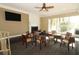 The community lounge area offers tables, chairs, a large TV, and a fireplace for socializing at 626 Orange Dr # 242, Altamonte Springs, FL 32701