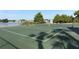 Enjoy a game of tennis on the community court featuring beautiful green surroundings at 626 Orange Dr # 242, Altamonte Springs, FL 32701