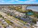 Aerial view showing the property with retail and major roads at 7550 Hinson St # 11C, Orlando, FL 32819