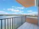 Relax on this balcony overlooking the lake, a serene outdoor space at 7550 Hinson St # 11C, Orlando, FL 32819