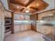 Elegant kitchen with custom cabinetry, granite countertops, and stainless steel appliances at 7550 Hinson St # 11C, Orlando, FL 32819