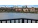 Picturesque lake view showcasing nearby resorts and townhouses at 7550 Hinson St # 11C, Orlando, FL 32819