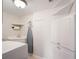 Functional laundry room with sink, storage cabinets, and modern appliances at 7550 Hinson St # 11C, Orlando, FL 32819