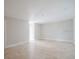 Spacious living room featuring neutral tile flooring, perfect for any style or decor at 8322 Lake Lucy Dr, Orlando, FL 32818