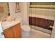 Bathroom features a vanity sink and neutral-colored walls at 913 Henley Cir, Davenport, FL 33896
