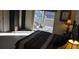 Bedroom with sliding glass doors to the lanai, and an accent painting at 913 Henley Cir, Davenport, FL 33896