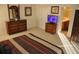 Bedroom includes ensuite bathroom and TV for ultimate convenience at 913 Henley Cir, Davenport, FL 33896