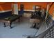 Finished garage equipped with a pool table, foosball table, and other amenities at 913 Henley Cir, Davenport, FL 33896