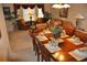 Elegant dining and living area featuring comfortable seating, decorative accents, and a spacious layout at 913 Henley Cir, Davenport, FL 33896