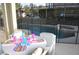 Inviting patio setup with a table, chairs, and views of the pool and jacuzzi at 913 Henley Cir, Davenport, FL 33896