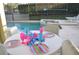 Inviting screened pool area with a table ready for dining near the pool at 913 Henley Cir, Davenport, FL 33896