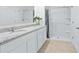 Bathroom featuring a double vanity with granite countertops and a stand up shower at 993 King Parc Rd, Orange City, FL 32763